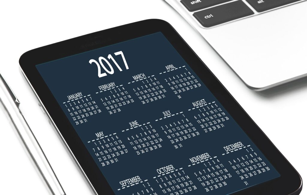 Mobile phone displaying a social media agenda on screen